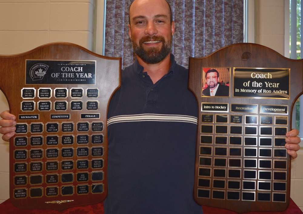 These coach of the year plaques named in honour of Ron Andres have special meaning for Darcy LaCroix. Photo by Stan Neufeld