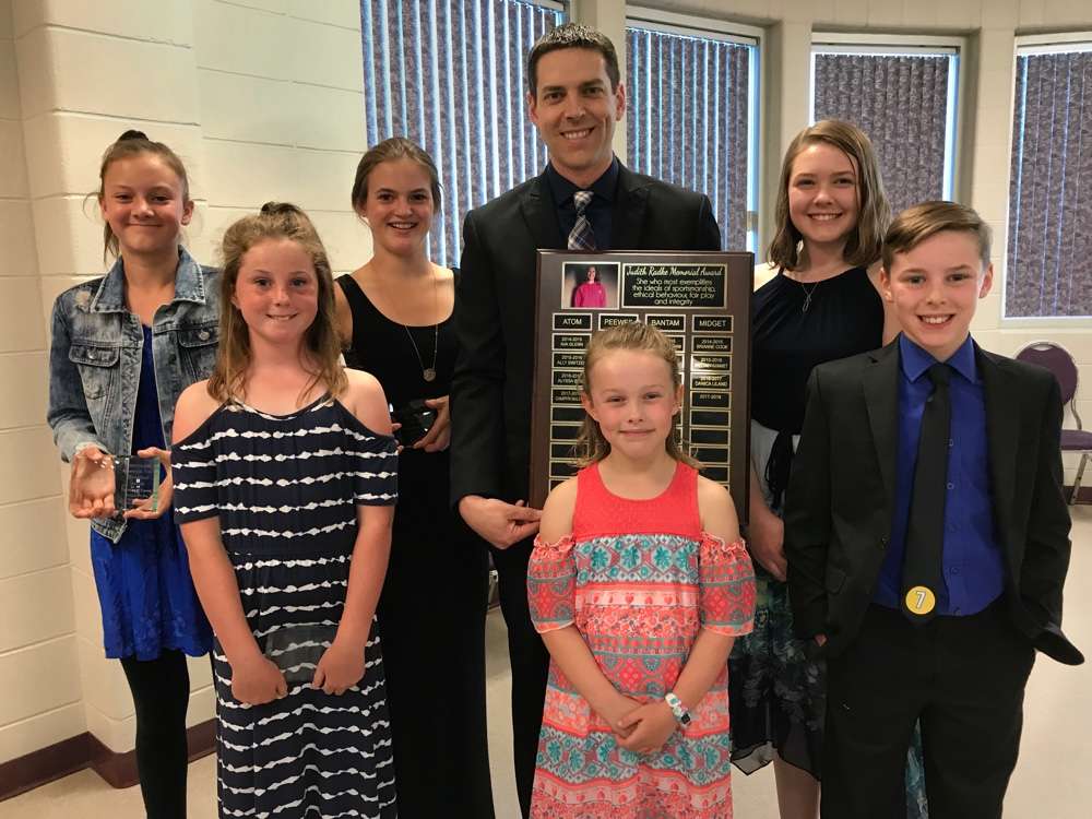 Radke family with award winners from left: Elyssa Scott, Camryn McLeod, Kirsten Tangen, Ben Radke, Pamela Radke, front, Sarah Radke and Alec Radke Photo courtesy of GPMH