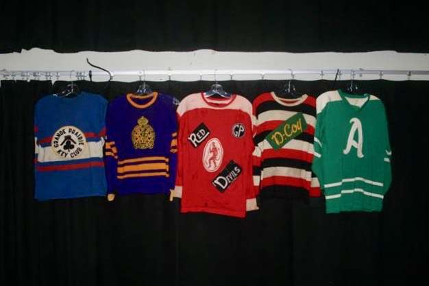 Billy Bessent and Max Henning wore sweaters like these representing five different local senior hockey teams-think of the history. Photo by Stan Neufeld
