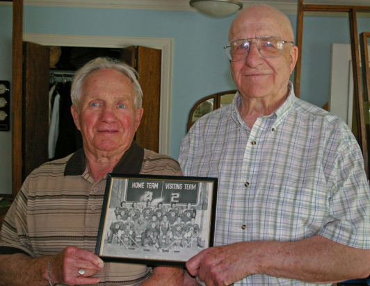 Billy Bessent, left, and Max Henning in the vintage photograph of the legendary Red Devil Team which planted a seed that grew into the GP Legends of Hockey project. Photo by Stan N