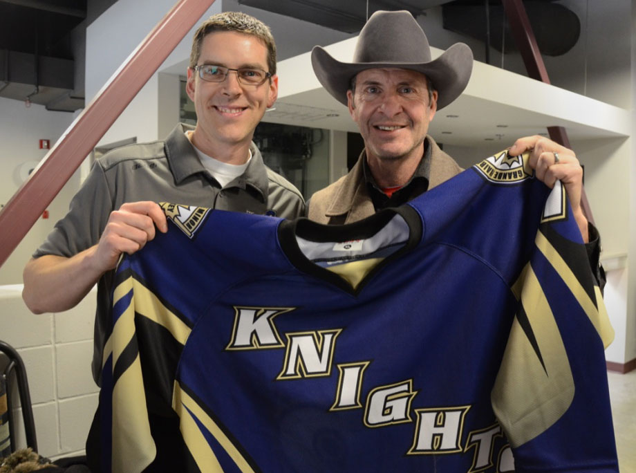Clint Malarchuk, right, received a Grande Prairie Minor Hockey jersey from GPMHA President Ben Radke in appreciation for his visit and talk during a minor hockey coaches appreciati